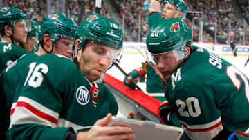 ST. PAUL, MN - DECEMBER 01: Jason Zucker #16 of the Minnesota Wild and Ryan Suter #20 of the Minnesota Wild review video during a game with the Toronto Maple Leafs at Xcel Energy Center on December 1, 2018 in St. Paul, Minnesota.(Photo by Bruce Kluckhohn/NHLI via Getty Images)
