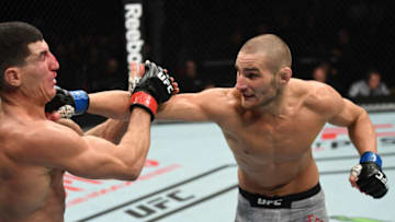 MONCTON, NB - OCTOBER 27: (R-L) Sean Strickland punches Nordine Taleb of France in their welterweight bout during the UFC Fight Night event inside Avenir Centre on October 27, 2018 in Moncton, New Brunswick, Canada. (Photo by Jeff Bottari/Zuffa LLC/Zuffa LLC via Getty Images)