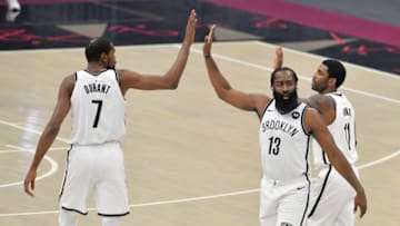 CLEVELAND, OHIO - JANUARY 20: Kevin Durant #7 James Harden #13 and Kyrie Irving #11 of the Brooklyn Nets (Photo by Jason Miller/Getty Images)