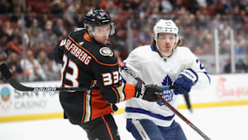 ANAHEIM, CA - NOVEMBER 16: Jakob Silfverberg #33 of the Anaheim Ducks pushes Kasperi Kapanen #24 of the Toronto Maple Leafs (Photo by Sean M. Haffey/Getty Images)