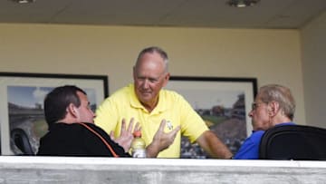 Mar 12, 2015; Port St. Lucie, FL, USA; New Jersey governor Chris Christie (left) with New York Mets general manager Sandy Alderson (middle) and owner Fred Wilpon chat during the game against the Washington Nationals at Tradition Field. Mandatory Credit: Brad Barr-USA TODAY Sports