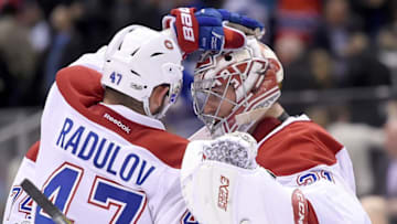 Jan 7, 2017; Toronto, Ontario, CAN; Montreal Canadiens forward Alexander Radulov (47) and goalie Carey Price (31) celebrate a 5-3 win over Toronto Maple Leafs at Air Canada Centre. Mandatory Credit: Dan Hamilton-USA TODAY Sports