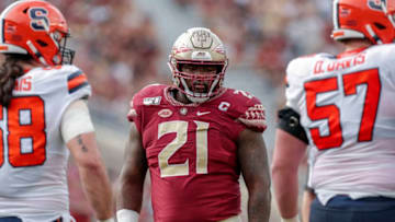 TALLAHASSEE, FL - OCTOBER 26: Defensive Tackle Marvin Wilson #21 of the Florida State Seminoles during the game against the Syracuse Orange at Doak Campbell Stadium on Bobby Bowden Field on October 26, 2019 in Tallahassee, Florida. The Seminoles defeated the Orange 35 to 17. (Photo by Don Juan Moore/Getty Images)