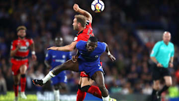 LONDON, ENGLAND - MAY 09: Laurent Depoitre of Huddersfield Town and Antonio Rudiger of Chelsea compete for the ball during the Premier League match between Chelsea and Huddersfield Town at Stamford Bridge on May 9, 2018 in London, England. (Photo by Clive Mason/Getty Images)
