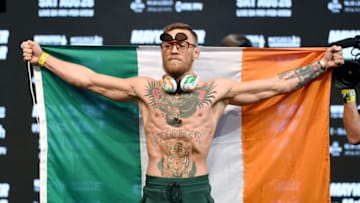 LAS VEGAS, NV - AUGUST 25: UFC lightweight champion Conor McGregor holds an Irish flag as he arrives at his official weigh-in at T-Mobile Arena on August 25, 2017 in Las Vegas, Nevada. McGregor will meet boxer Floyd Mayweather Jr. in a super welterweight boxing match at T-Mobile Arena on August 26. (Photo by Ethan Miller/Getty Images)