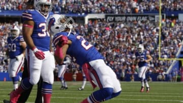 Oct 12, 2014; Orchard Park, NY, USA; Buffalo Bills running back Fred Jackson (22) celebrates his second half touchdown against the New England Patriots at Ralph Wilson Stadium. New England beats Buffalo 37 to 22. Mandatory Credit: Timothy T. Ludwig-USA TODAY Sports