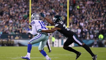 PHILADELPHIA, PA - NOVEMBER 11: Wide receiver Amari Cooper #19 of the Dallas Cowboys is brought down by cornerback Rasul Douglas #32 of the Philadelphia Eagles in the first quarter at Lincoln Financial Field on November 11, 2018 in Philadelphia, Pennsylvania. (Photo by Brett Carlsen/Getty Images)
