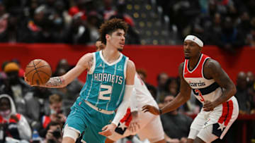 Nov 22, 2021; Washington, District of Columbia, USA; Charlotte Hornets guard LaMelo Ball (2) dribbles as Washington Wizards guard Bradley Beal (3) defends during the second half at Capital One Arena. Mandatory Credit: Tommy Gilligan-USA TODAY Sports