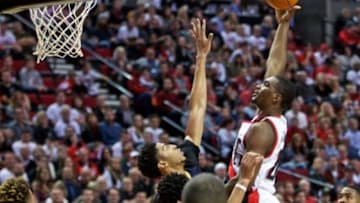 Oct 28, 2015; Portland, OR, USA; Portland Trail Blazers forward Noah Vonleh (21) shoots over New Orleans Pelicans forward Anthony Davis (23) during the fourth quarter at the Moda Center. Mandatory Credit: Craig Mitchelldyer-USA TODAY Sports