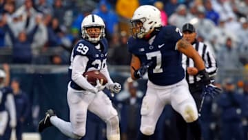 STATE COLLEGE, PA - OCTOBER 27: John Reid #29 of the Penn State Nittany Lions returns an interception 44 yards to the 3 yard line in the first half against the Iowa Hawkeyes on October 27, 2018 at Beaver Stadium in State College, Pennsylvania. (Photo by Justin K. Aller/Getty Images)