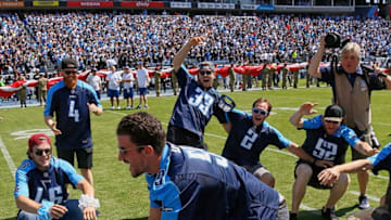 NASHVILLE, TN - SEPTEMBER 10: Roman Josi of the Nashville Predators National Hockey League team drives a sword into the ground prior to National Football League game between the Tennessee Titans and the Oakland Raiders at Nissan Stadium on September 10, 2017 in Nashville, Tennessee. (Photo by Frederick Breedon/Getty Images)