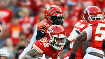 KANSAS CITY, MO - AUGUST 10: Tyrann Mathieu #32 of the Kansas City Chiefs picks up a fumbled football in the first quarter against the Cincinnati Bengals during a preseason game at Arrowhead Stadium on August 10, 2019 in Kansas City, Missouri. (Photo by David Eulitt/Getty Images)