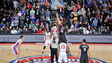 AUBURN HILLS, MI - JANUARY 16: The opening tip off between Andre Drummond #0 of the Detroit Pistons and Andrew Bogut #12 of the Golden State Warriors on January 16, 2016 at The Palace of Auburn Hills in Auburn Hills, Michigan. NOTE TO USER: User expressly acknowledges and agrees that, by downloading and/or using this photograph, User is consenting to the terms and conditions of the Getty Images License Agreement. Mandatory Copyright Notice: Copyright 2016 NBAE (Photo by Allen Einstein/NBAE via Getty Images)