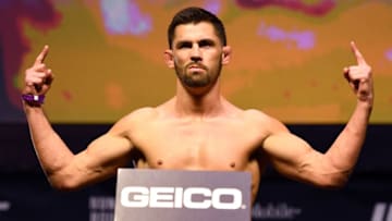 LAS VEGAS, NV - DECEMBER 29: UFC bantamweight champion Dominick Cruz poses on the scale during the UFC 207 weigh-in at T-Mobile Arena on December 29, 2016 in Las Vegas, Nevada. (Photo by Josh Hedges/Zuffa LLC/Zuffa LLC via Getty Images)