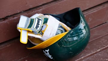 PHILADELPHIA, PA - SEPTEMBER 17: A pair of Franklin batting gloves sit in an Oakland Athletics's batting helmet before a game against the Philadelphia Phillies at Citizens Bank Park on September 17, 2017 in Philadelphia, Pennsylvania. (Photo by Rich Schultz/Getty Images)