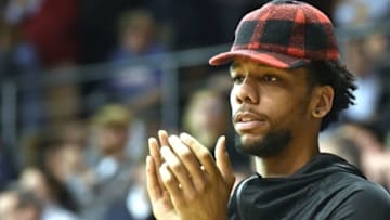Mar 1, 2016; Villanova, PA, USA; Philadelphia 76ers forward Jahlil Okafor watches game between Villanova Wildcats and DePaul Blue Demons during the second half at The Pavilion. Villanova defeated DePaul, 83-62. Mandatory Credit: Eric Hartline-USA TODAY Sports