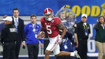 Dec 31, 2015; Arlington, TX, USA; Alabama Crimson Tide cornerback Cyrus Jones (5) returns a punt for a touchdown in the 2015 CFP semifinal at the Cotton Bowl against Michigan State Spartans cornerback Demetrious Cox (7) at AT&T Stadium. Mandatory Credit: Matthew Emmons-USA TODAY Sports