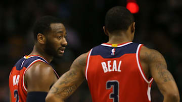 BOSTON, MA - MARCH 20: John Wall #2 of the Washington Wizards and Bradley Beal #3 talk together during the third quarter against the Boston Celtics at TD Garden on March 20, 2017 in Boston, Massachusetts. NOTE TO USER: User expressly acknowledges and agrees that, by downloading and or using this Photograph, user is consenting to the terms and conditions of the Getty Images License Agreement. (Photo by Maddie Meyer/Getty Images)