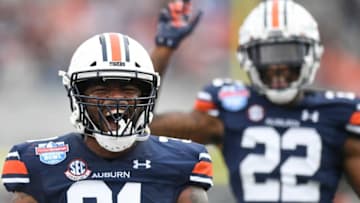 Auburn football linebacker Chandler Wooten (31) celebrates an interception against Houston during the Birmingham Bowl at Protective Stadium in Birmingham, Ala., on Tuesday December 28, 2021.Wooten01