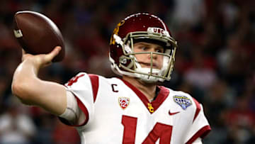 ARLINGTON, TX - DECEMBER 29: Sam Darnold #14 of the USC Trojans looks to throw against the Ohio State Buckeyes in the first half of the 82nd Goodyear Cotton Bowl Classic between USC and Ohio State at AT&T Stadium on December 29, 2017 in Arlington, Texas. (Photo by Ron Jenkins/Getty Images)