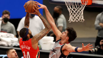 WASHINGTON, DC - APRIL 16: Deni Avdija #9 of the Washington Wizards blocks a shot by Brandon Ingram #14 of the New Orleans Pelicans in the first half at Capital One Arena on April 16, 2021 in Washington, DC. NOTE TO USER: User expressly acknowledges and agrees that, by downloading and or using this photograph, User is consenting to the terms and conditions of the Getty Images License Agreement. (Photo by Rob Carr/Getty Images)