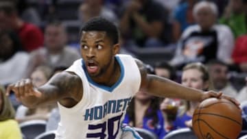Apr 12, 2015; Auburn Hills, MI, USA; Charlotte Hornets guard Troy Daniels (30) dribbles the ball during the second quarter against the Detroit Pistons at The Palace of Auburn Hills. Mandatory Credit: Raj Mehta-USA TODAY Sports