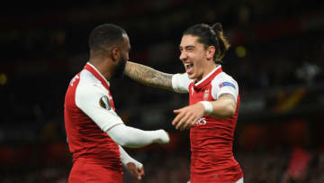 LONDON, ENGLAND - APRIL 26: Alexandre Lacazette of Arsenal celebrates with team mate Hector Bellerin after scoring during the UEFA Europa League Semi Final leg one match between Arsenal FC and Atletico Madrid at Emirates Stadium on April 26, 2018 in London, United Kingdom. (Photo by Mike Hewitt/Getty Images)