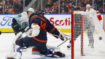 Seattle Kraken forward Jared McCann (19) scores a goal against Edmonton Oilers goaltender Stuart Skinner (74) Mandatory Credit: Perry Nelson-USA TODAY Sports