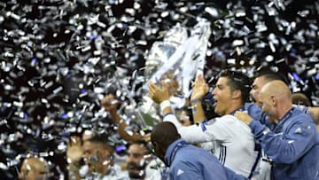 CARDIFF, WALES - JUNE 03: Cristiano Ronaldo of Real Madrid celebrates with his team mates after victory in the UEFA Champions League Final between Juventus and Real Madrid at National Stadium of Wales on June 3, 2017 in Cardiff, Wales. (Photo by Laurence Griffiths/Getty Images)