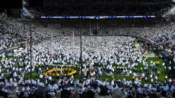 Oct 22, 2016; University Park, PA, USA; Penn State Nittany Lions fans celebrate their teams victory on the field against the Ohio State Buckeyes at Beaver Stadium. Penn State defeated Ohio State 24-21. Mandatory Credit: Rich Barnes-USA TODAY Sports