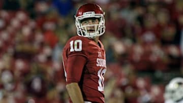 NORMAN, OK - SEPTEMBER 10 : Quarterback Austin Kendall #10 of the Oklahoma Sooners looks to the sidelines during the game against the Louisiana Monroe Warhawks September 10, 2016 at Gaylord Family Memorial Stadium in Norman, Oklahoma. The Sooners defeated the Warhawks 59-17. (Photo by Brett Deering/Getty Images)