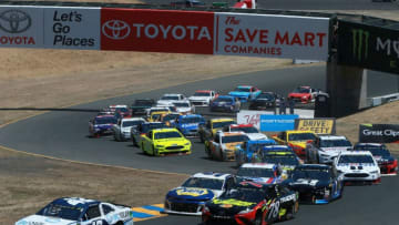 SONOMA, CA - JUNE 24: Kyle Larson, driver of the #42 DC Solar Chevrolet, leads the field during the Monster Energy NASCAR Cup Series Toyota/Save Mart 350 at Sonoma Raceway on June 24, 2018 in Sonoma, California. (Photo by Sean Gardner/Getty Images)