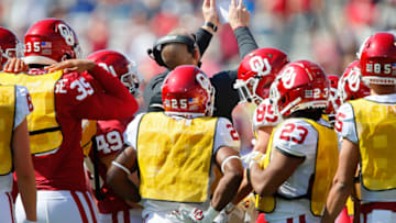 NORMAN, OK - APRIL 24: Defensive coordinator Alex Grinch of the Oklahoma Sooners sketches out a play for the defense during their spring game at Gaylord Family Oklahoma Memorial Stadium on April 24, 2021 in Norman, Oklahoma. (Photo by Brian Bahr/Getty Images)