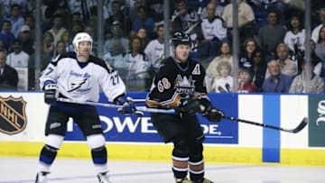 TAMPA, FL - APRIL 12: Jaromir Jagr #68 of the Washington Capitals waits for a pass as Tim Taylor #27 of the Tampa Bay Lightning defends during game 2 in round one of the NHL 2003 Stanley Cup Playoffs at the St. Pete Times Forum on April 12, 2003 in Tampa, Florida. The Capitals defeated the Lightning 6-3. (Photo by Matt Stroshane/Getty Images/NHLI)