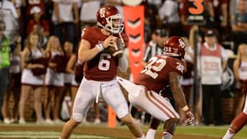 Sep 17, 2016; Norman, OK, USA; Oklahoma Sooners quarterback Baker Mayfield (6) scrambles in the pocket against the Ohio State Buckeyes in the fourth quarter at Gaylord Family - Oklahoma Memorial Stadium. Mandatory Credit: Mark D. Smith-USA TODAY Sports