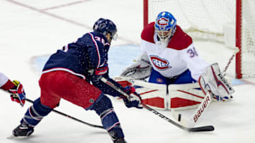 COLUMBUS, OH - MARCH 12: Columbus Blue Jackets center Boone Jenner (38) attempts a shot on goal as Montreal Canadiens goaltender Charlie Lindgren (39) blocks in the first period of a game between the Columbus Blue Jackets and the Montreal Canadiens on March 12, 2018 at Nationwide Arena in Columbus, OH.(Photo by Adam Lacy/Icon Sportswire via Getty Images)