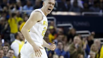 Jan 12, 2016; Ann Arbor, MI, USA; Michigan Wolverines guard Duncan Robinson (22) reacts after making a three point shot in the first half against the Maryland Terrapins at Crisler Center. Mandatory Credit: Rick Osentoski-USA TODAY Sports