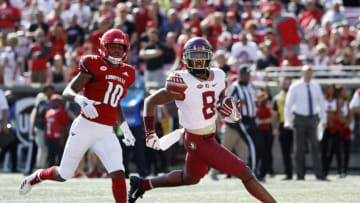 LOUISVILLE, KY - SEPTEMBER 29: Nyqwan Murray #8 of the Florida State Seminoles runs into the end zone for a 17-yard touchdown after catching a pass ahead of Rodjay Burns #10 of the Louisville Cardinals in the first quarter of the game at Cardinal Stadium on September 29, 2018 in Louisville, Kentucky. (Photo by Joe Robbins/Getty Images)