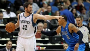 Nov 8, 2013; Minneapolis, MN, USA; Minnesota Timberwolves forward Kevin Love (42) calls a play defended by Dallas Mavericks forward Shawn Marion (0) during the second quarter at Target Center. Mandatory Credit: Brace Hemmelgarn-USA TODAY Sports