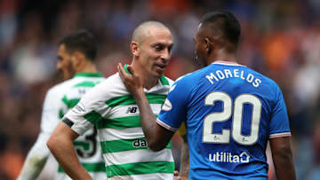 GLASGOW, SCOTLAND - SEPTEMBER 01: Celtic captain Scott Brown interacts with Alfredo Morelos of Rangers during the Ladbrokes Premiership match between Rangers and Celtic at Ibrox Stadium on September 01, 2019 in Glasgow, Scotland. (Photo by Ian MacNicol/Getty Images)