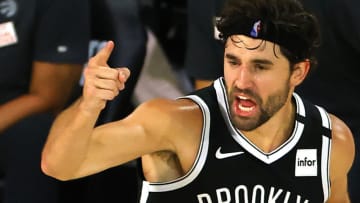 Joe Harris #12 of the Brooklyn Nets reacts after hitting a three point basket against the Toronto Raptors during the fourth quarter in Game Two of the Eastern Conference First Round during the 2020 NBA Playoffs at The Field House at ESPN Wide World Of Sports Complex on August 19, 2020 in Lake Buena Vista, Florida. NOTE TO USER: User expressly acknowledges and agrees that, by downloading and or using this photograph, User is consenting to the terms and conditions of the Getty Images License Agreement. (Photo by Kevin C. Cox/Getty Images)