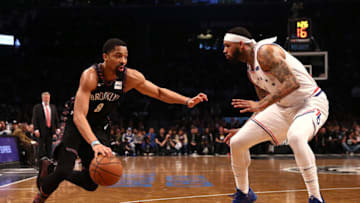 Spencer Dinwiddie, Mike Scott, Sixers (Photo by Elsa/Getty Images)