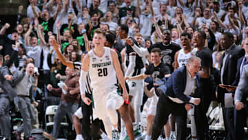 EAST LANSING, MI - FEBRUARY 20: Matt McQuaid #20 of the Michigan State Spartans celebrates his three-point basket in the second half against the Rutgers Scarlet Knights at Breslin Center on February 20, 2019 in East Lansing, Michigan. (Photo by Rey Del Rio/Getty Images)