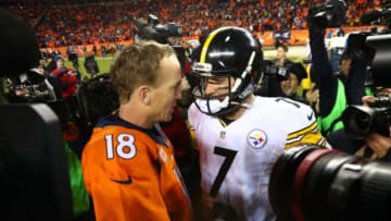 Jan 17, 2016; Denver, CO, USA; Denver Broncos quarterback Peyton Manning (18) shakes hands with Pittsburgh Steelers quarterback Ben Roethlisberger (7) after the AFC Divisional round playoff game at Sports Authority Field at Mile High. Denver won 23-16. Mandatory Credit: Mark J. Rebilas-USA TODAY Sports