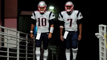 Sep 11, 2016; Glendale, AZ, USA; New England Patriots quarterback Jimmy Garoppolo (10) and quarterback Jacoby Brissett (7) take the field for warm ups prior to the game against the Arizona Cardinals at University of Phoenix Stadium. Mandatory Credit: Matt Kartozian-USA TODAY Sports