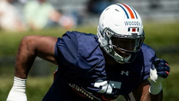 Auburn football defensive end Colby Wooden (25) runs drills during an open football practice at Jordan-Hare Stadium in Auburn, Ala., on Saturday, March 20, 2021.