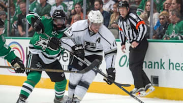 Mar 15, 2016; Dallas, TX, USA; Dallas Stars defenseman Johnny Oduya (47) defends against Los Angeles Kings center Anze Kopitar (11) during the second period at the American Airlines Center. Mandatory Credit: Jerome Miron-USA TODAY Sports