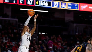 Cincinnati Bearcats guard Jeremiah Davenport hits jump shot against East Carolina Pirates at Fifth Third Arena. The Enquirer.