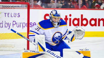 Oct 20, 2022; Calgary, Alberta, CAN; Buffalo Sabres goaltender Eric Comrie (31) guards his net against the Calgary Flames during the second period at Scotiabank Saddledome. Mandatory Credit: Sergei Belski-USA TODAY Sports