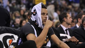 Dec 10, 2016; Memphis, TN, USA; Golden State Warriors guard Stephen Curry (30) sits on the bench during the second half against the Memphis Grizzlies at FedExForum. The Grizzlies won 110-89. Mandatory Credit: Justin Ford-USA TODAY Sports